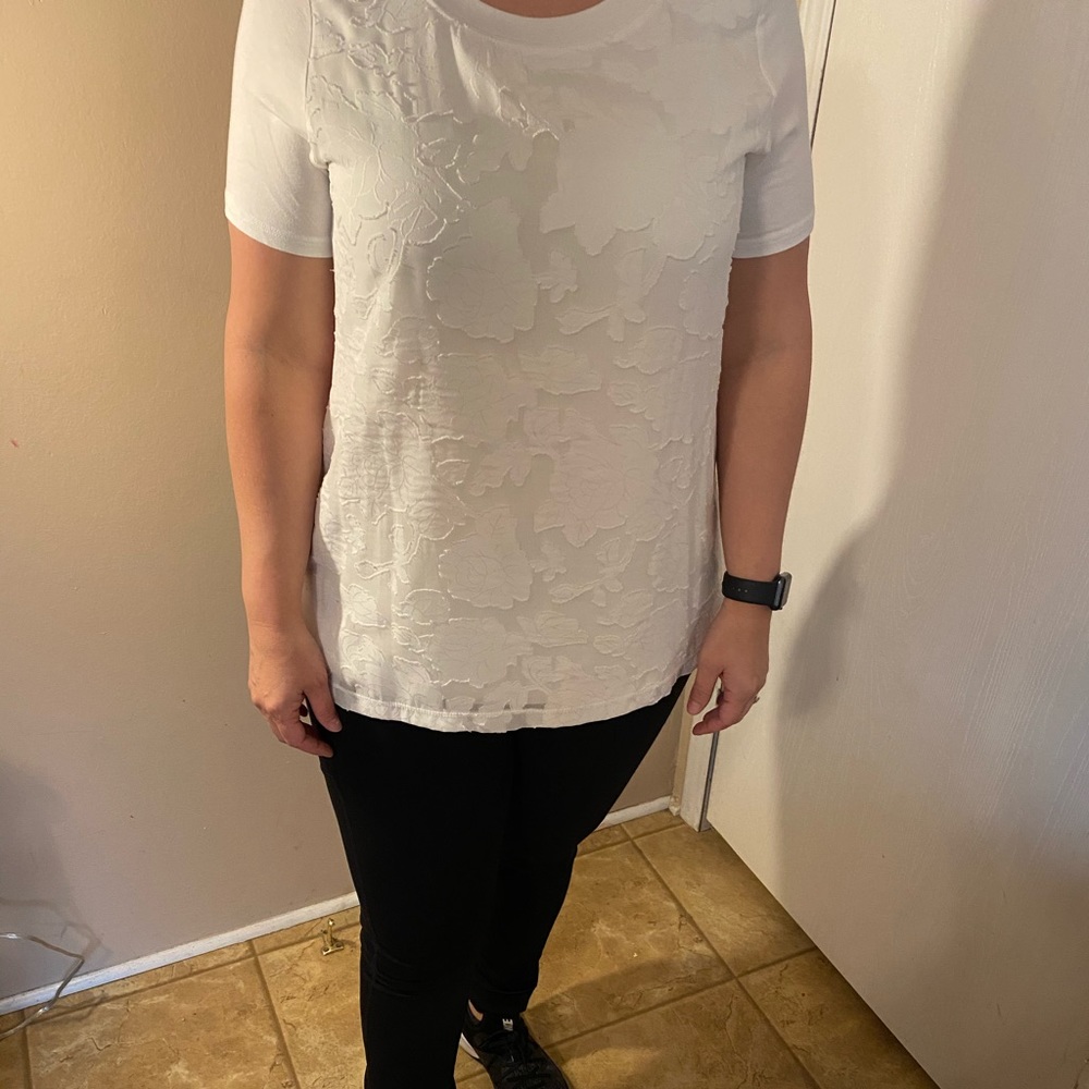 White blouse with flower detail
